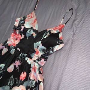 This is a formal floral dress worn once